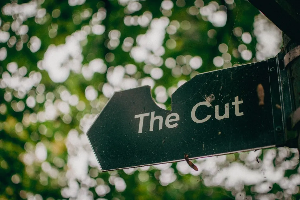 The entrance to one of the hotels where I work. A sign reading The Cut.